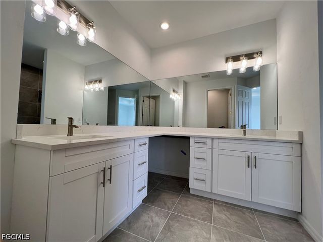 628 Falls LN, Lehigh Acres, FL 33974
