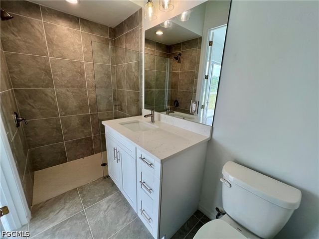 628 Falls LN, Lehigh Acres, FL 33974