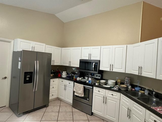 1142 NW Lombardy Drive, Port St. Lucie, FL 34986