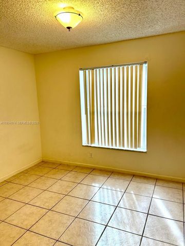 4779 NW 5th Ct, Coconut Creek, FL 33063