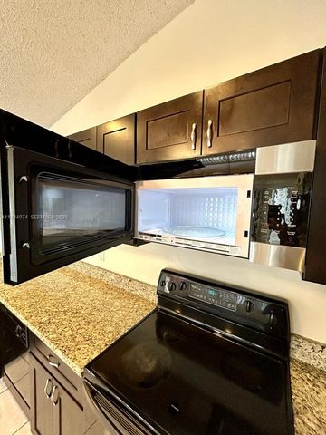 4779 NW 5th Ct, Coconut Creek, FL 33063