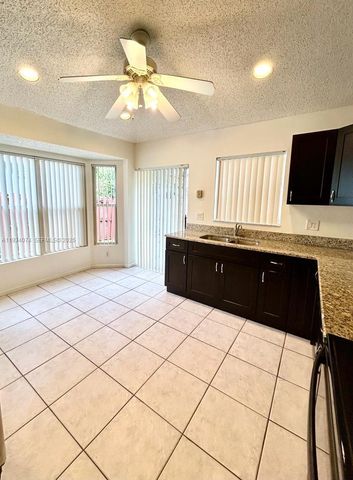 4779 NW 5th Ct, Coconut Creek, FL 33063
