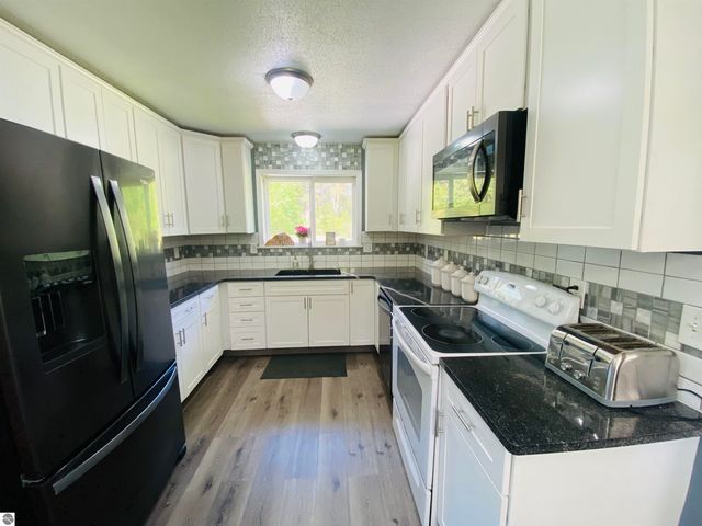737 Sensabaugh Road, Lupton, MI 48635