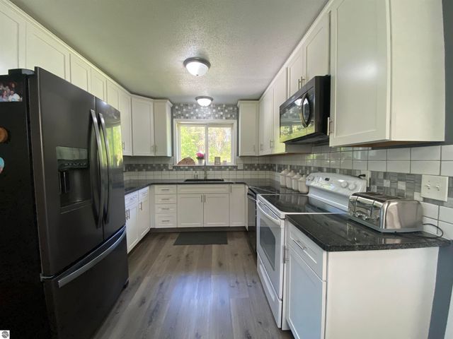 737 Sensabaugh Road, Lupton, MI 48635