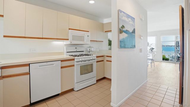 49 Canoe Place Road 416, Hampton Bays, NY 11946