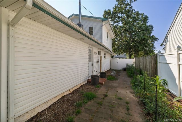 9 Robinson Drive, Shirley, NY 11967