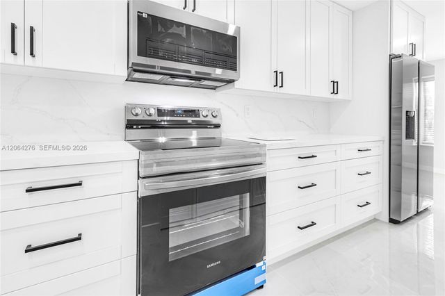 8957 NW 44th Court, Sunrise, FL 33351
