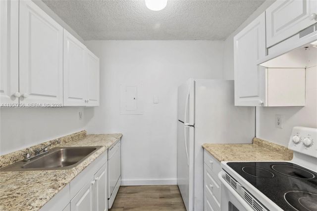 1133 N Benoist Farms Rd 101, West Palm Beach, FL 33411