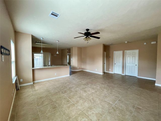 10803 Woodwind Shadows Drive, Cypress, TX 77433