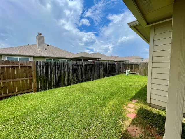 10803 Woodwind Shadows Drive, Cypress, TX 77433