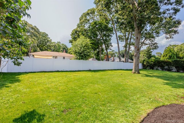 126 Holiday Boulevard, Center Moriches, NY 11934