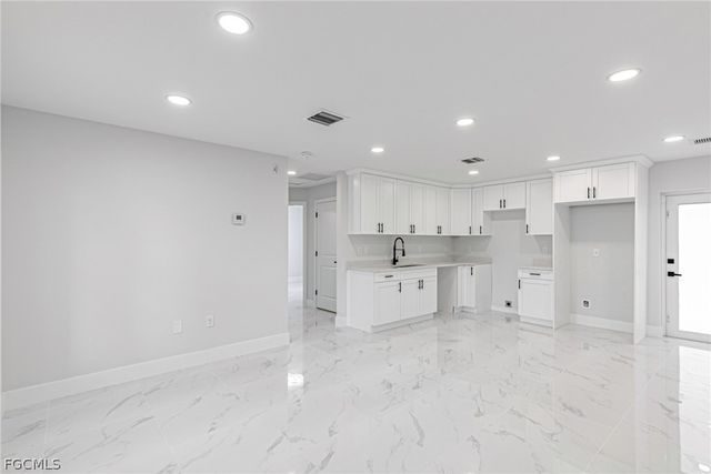 1120 Ravenswood ST E, Lehigh Acres, FL 33974