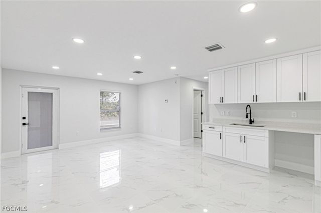 1120 Ravenswood ST E, Lehigh Acres, FL 33974