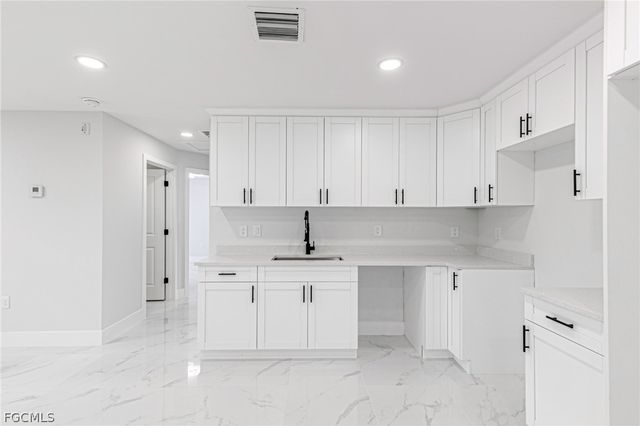 1120 Ravenswood ST E, Lehigh Acres, FL 33974