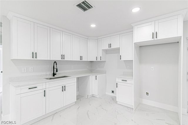 1120 Ravenswood ST E, Lehigh Acres, FL 33974