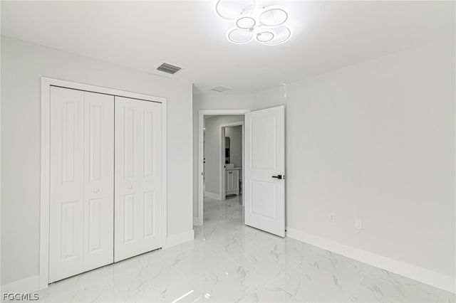 1120 Ravenswood ST E, Lehigh Acres, FL 33974