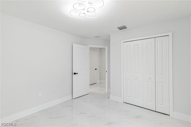 1120 Ravenswood ST E, Lehigh Acres, FL 33974