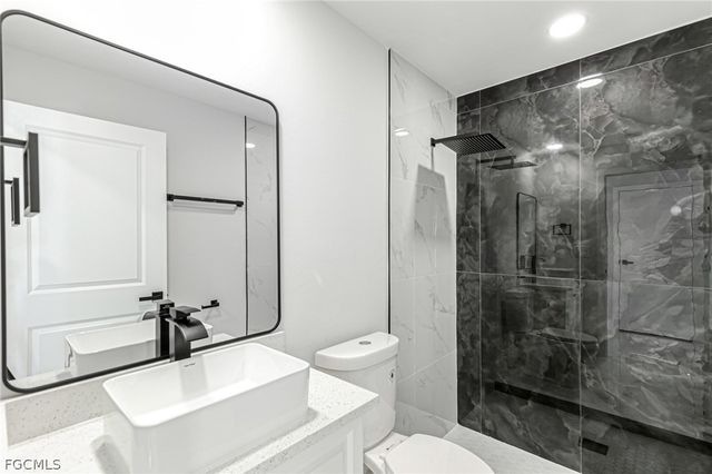 1120 Ravenswood ST E, Lehigh Acres, FL 33974