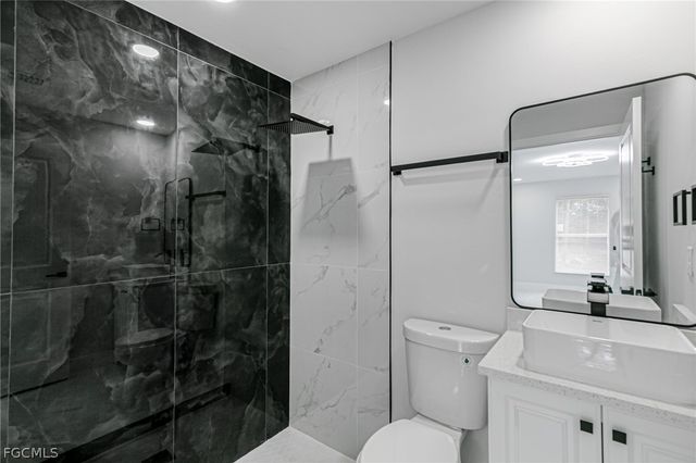 1120 Ravenswood ST E, Lehigh Acres, FL 33974