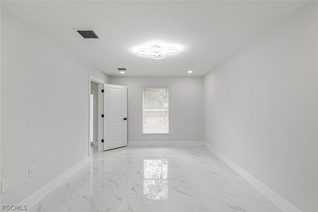 1120 Ravenswood ST E, Lehigh Acres, FL 33974