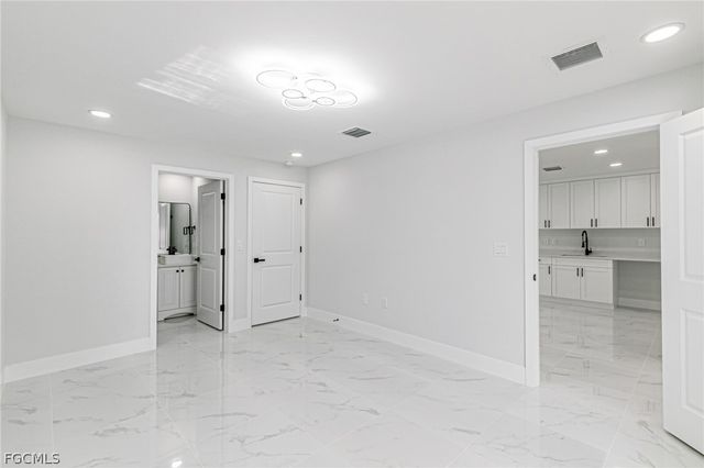 1120 Ravenswood ST E, Lehigh Acres, FL 33974