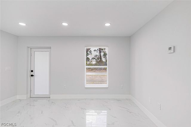 1120 Ravenswood ST E, Lehigh Acres, FL 33974