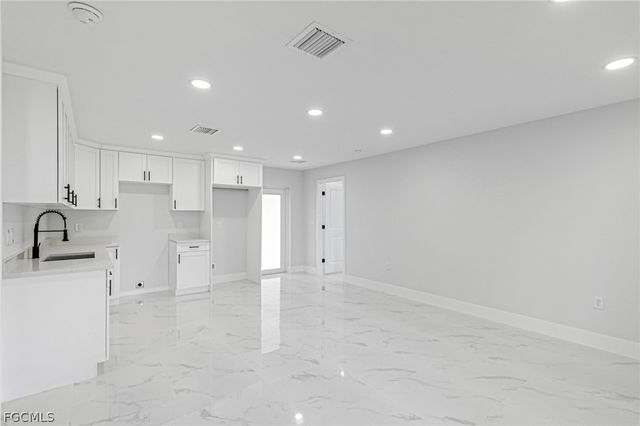 1120 Ravenswood ST E, Lehigh Acres, FL 33974