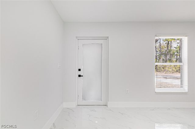 1120 Ravenswood ST E, Lehigh Acres, FL 33974