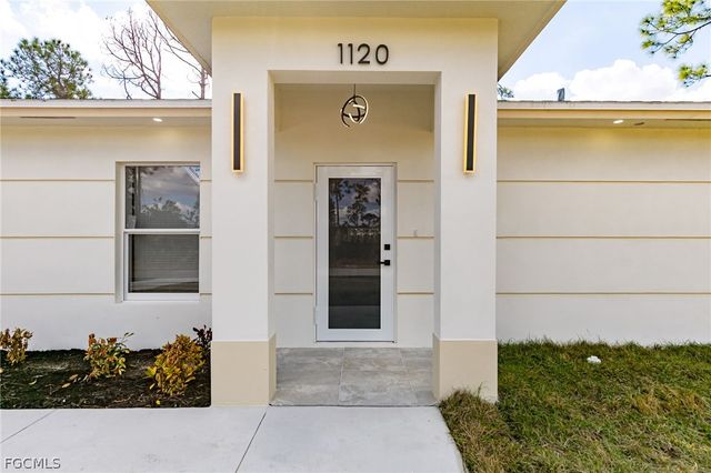1120 Ravenswood ST E, Lehigh Acres, FL 33974