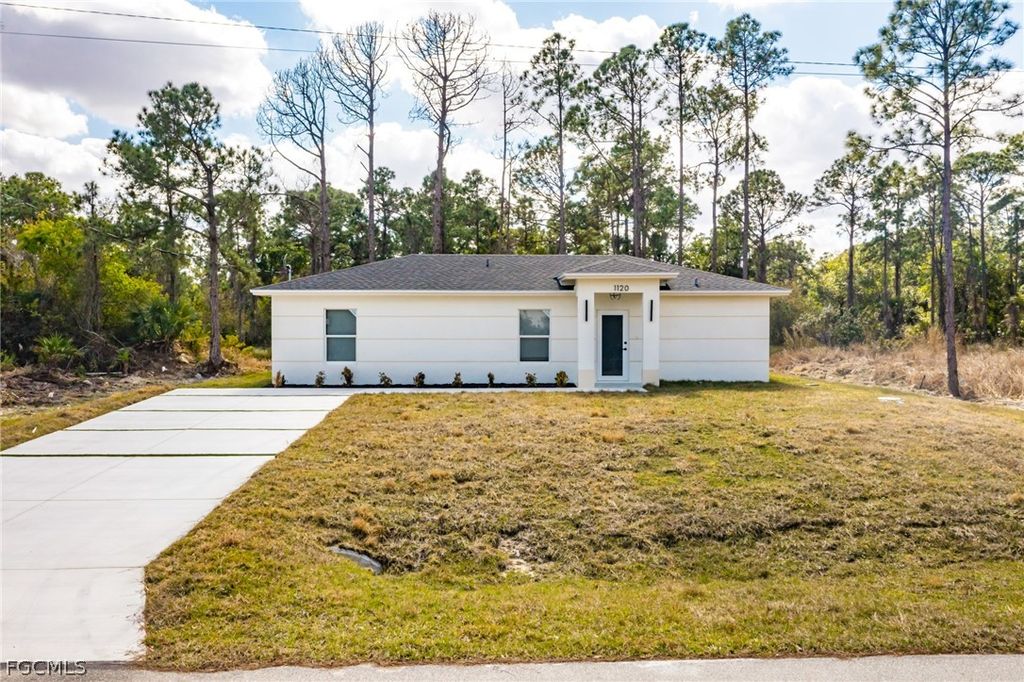 1120 Ravenswood ST E, Lehigh Acres, FL 33974
