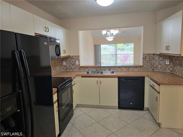5741 Whitaker RD D203, Naples, FL 34112