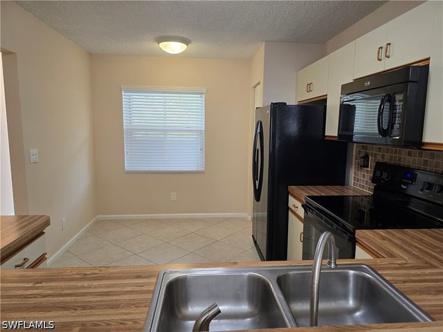 5741 Whitaker RD D203, Naples, FL 34112