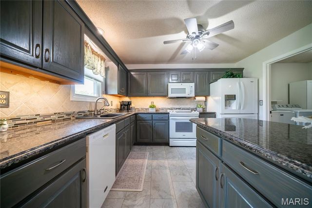 5111 E Flamingo Drive, Hallsville, MO 65255