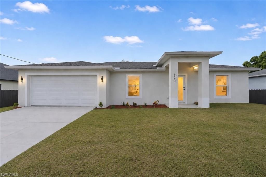 720 Grant BLVD, LEHIGH ACRES, FL 33974 — exterior