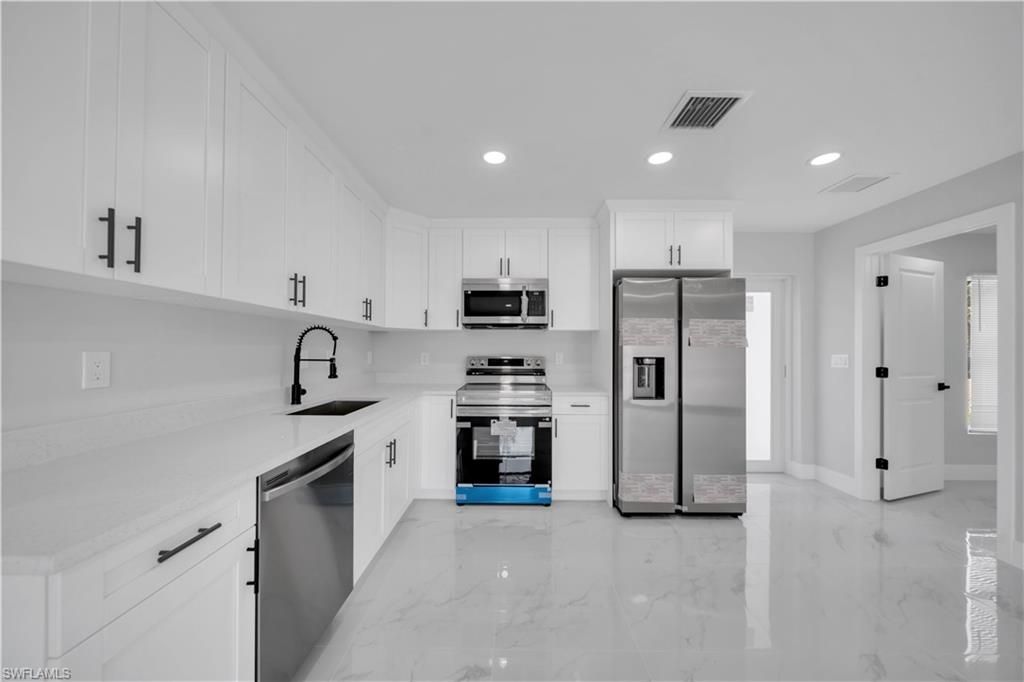 2604 51st ST SW, LEHIGH ACRES, FL 33976 — photo 4