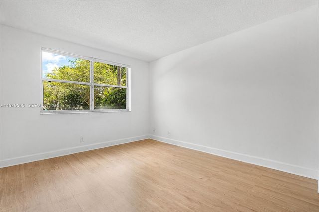 8721 Wiles Road 105, Coral Springs, FL 33067