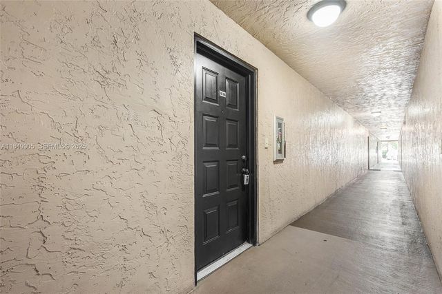 8721 Wiles Road 105, Coral Springs, FL 33067