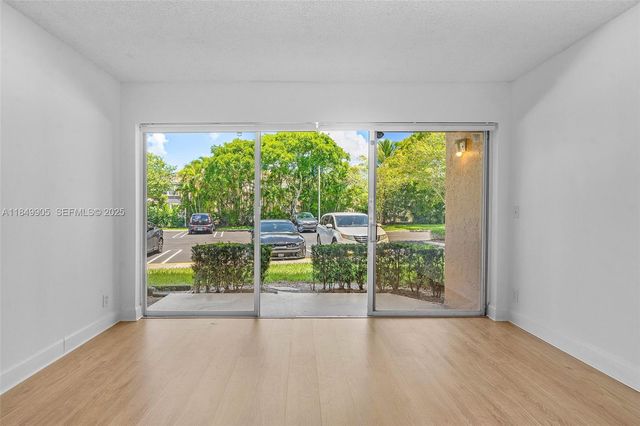 8721 Wiles Road 105, Coral Springs, FL 33067