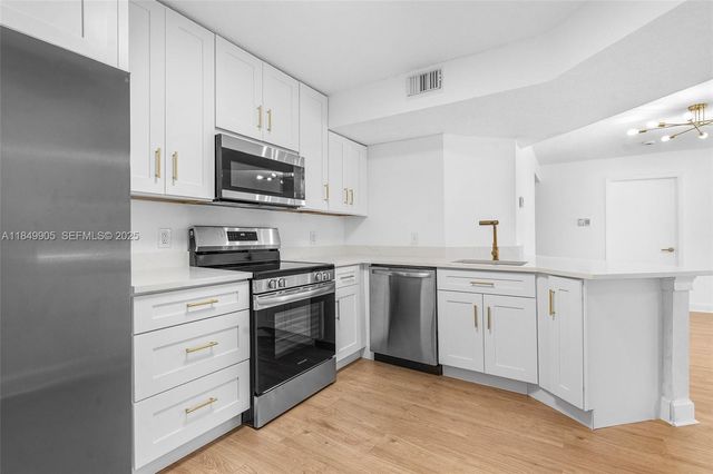 8721 Wiles Road 105, Coral Springs, FL 33067