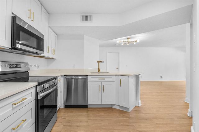8721 Wiles Road 105, Coral Springs, FL 33067