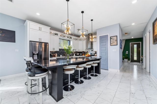 8826 Houston Falls Lane, Richmond, TX 77407