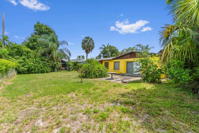 877 Sarazen Drive, Lake Belvedere Estates, West Palm Beach, FL 33413