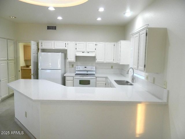 15025 W YOSEMITE Drive, Sun City West, AZ 85375