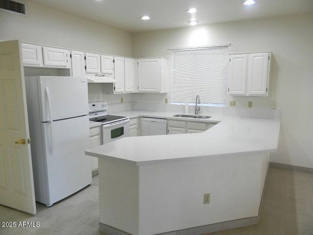 15025 W YOSEMITE Drive, Sun City West, AZ 85375