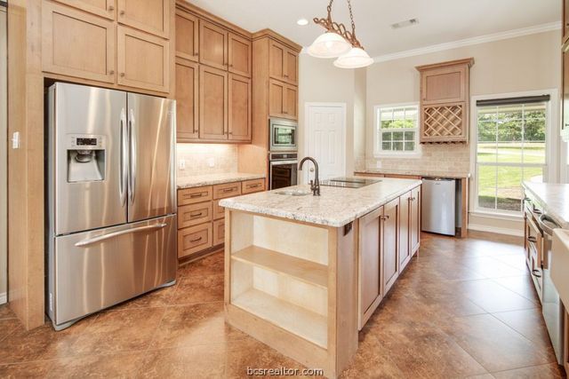 7710 Elmo Weedon Road, Bryan, TX 77808