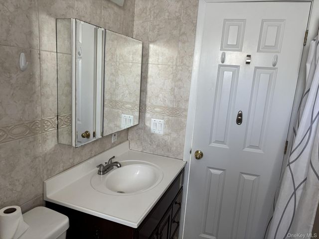 26 Polo Lane, Westbury, NY 11590