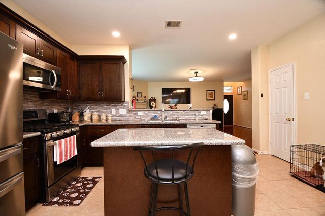 7110 Anaquitas Creek Court, Richmond, TX 77407