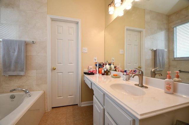 7110 Anaquitas Creek Court, Richmond, TX 77407