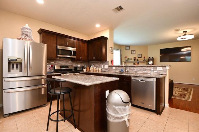 7110 Anaquitas Creek Court, Richmond, TX 77407