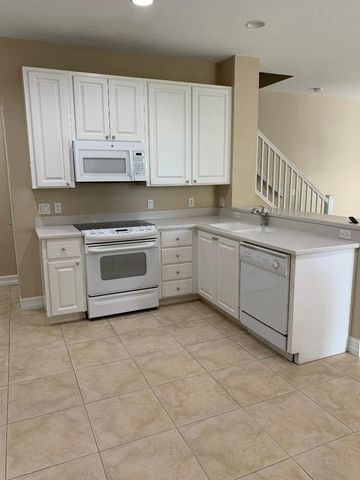1176 Pinewood Lake Court, Greenacres, FL 33415